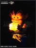 photo of KID Goku whith Dragon Ball of his grandfather Gohan