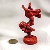 photo of A little quiet, dog girl RED / STATUE